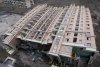 wsj_shanghai_building_collapses_nearly_intact_01_090629_small.jpg